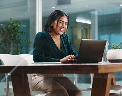 Woman working on desk banner